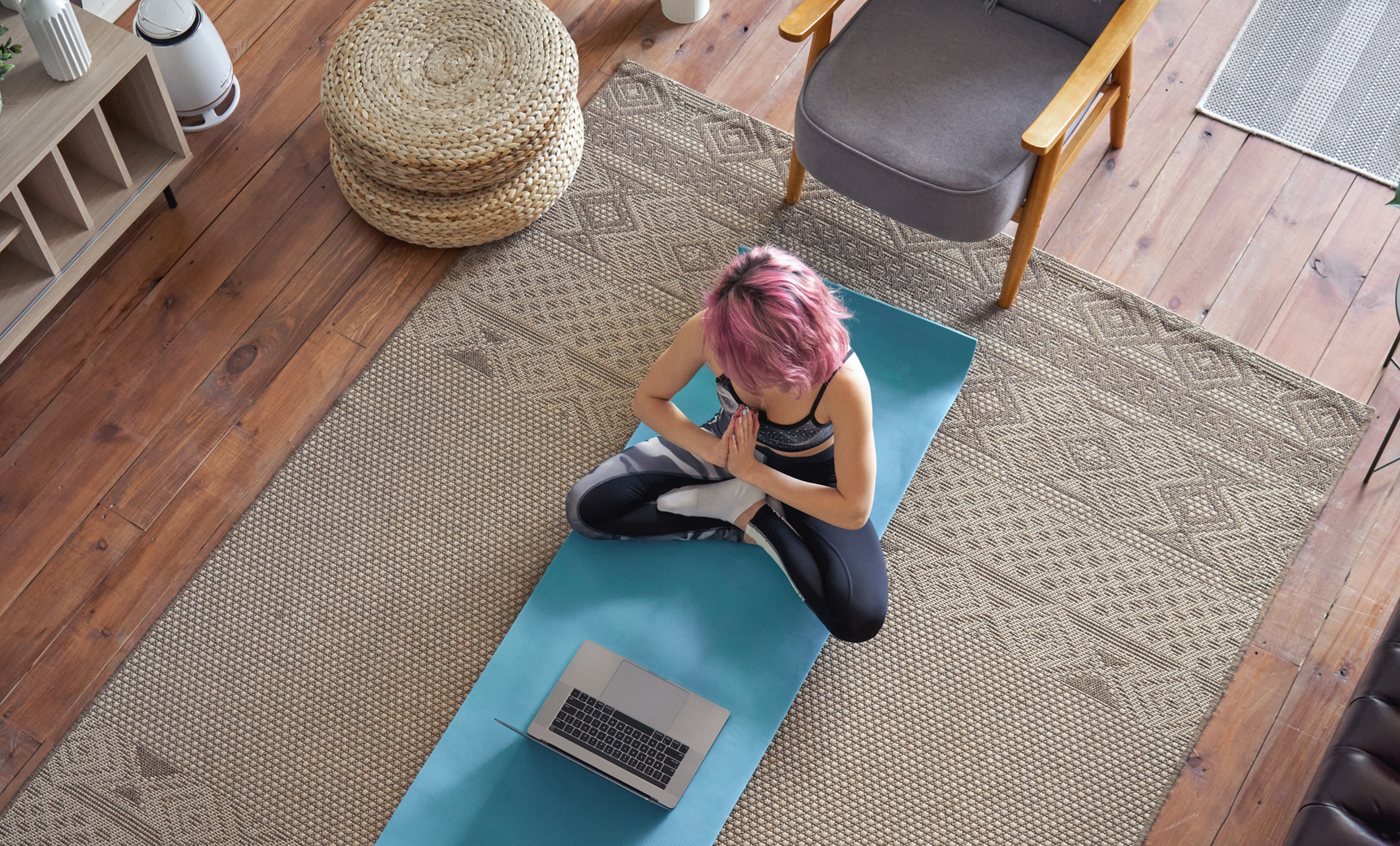 Woman Following an Online Yoga Class 